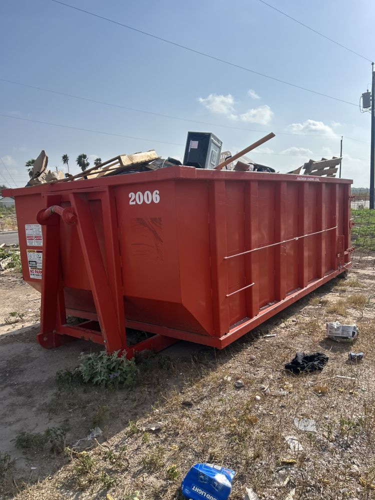 Loaded Rockin JL roll off dumpster